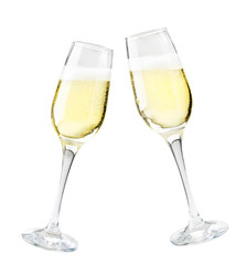 Two glasses of champagne on a white background. Isolated