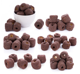 Crunchy corn chocolate snacks on a white background