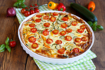 Quiche with tomatoes, spinach and feta cheese