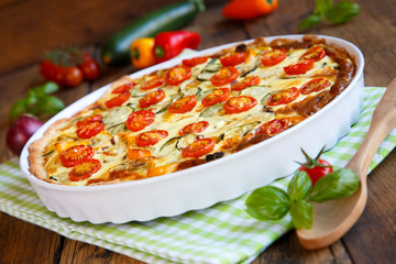 Quiche with tomatoes, spinach and feta cheese