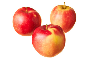 Three whole fresh red apples isolated on white background without shadow. Close-up