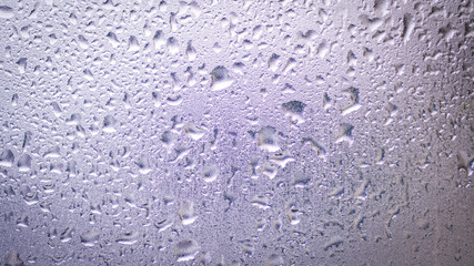 Water drops on glass for background and design