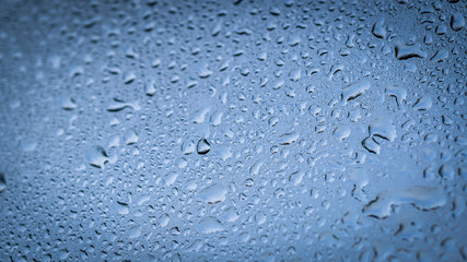 Water drops on glass for background and design