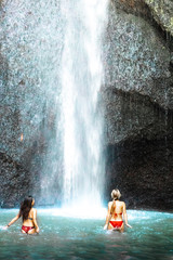 Girls in the waterfall