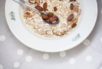 Oatmeal bowl with nuts, useful food