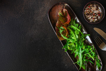 Healthy salad, leaves mix (mix micro greens, arugula, onion, other ingredients). food background. copy space