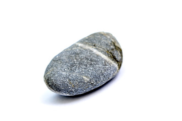 stone from the beach pictured in studio on white background