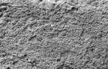 grain stone texture, black-and-white background, concrete close up ; gray clay macro