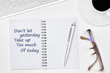 Don't let yesterday Take up Too much of today text on notebook page