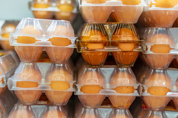 small shop. close-up. the egg is laid in a transparent plastic box.