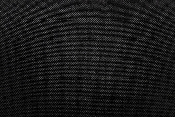 Textured Charcoal Black Textile Fabric Swatch. Black fabric texture background. Detail of canvas textile material. backgraund textur, backdrop wallpaper. For designer and printing