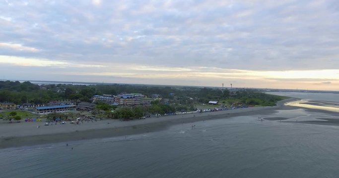 Panoramic View of the Beach and Stone Shaped Like a Piece of Cheese