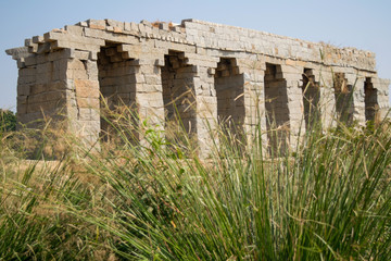 Ancient ruins of aqueduct in Vijayanagar city in Hampi, Karnataka, unesco heritage