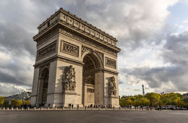 Arc de Triomphe in Paris. In distance there is visible Eiffel Tower