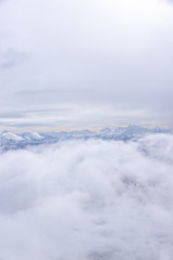 Obraz premium Mont Blanc. Aerial view of the Alps surrounded by clouds.