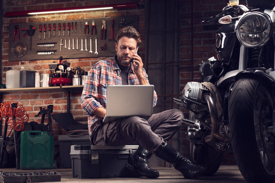 Mechanic or biker working in a workshop