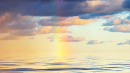 Fototapeta na wymiar Rainbow over the sea in Denmark