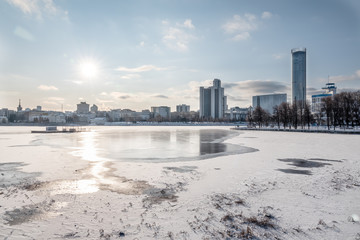 Frozen pond in the city center.