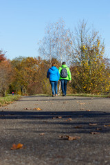 couple walking in fall