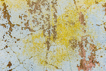 Texture of a concrete wall with cracks and scratches which can be used as a background