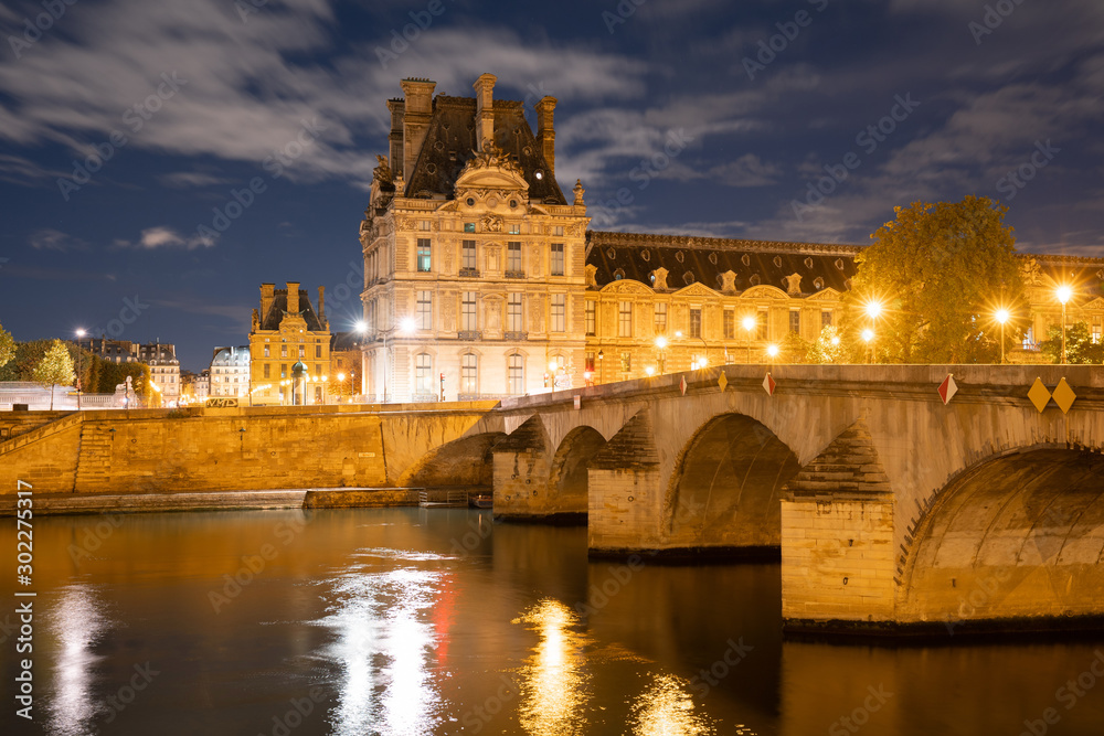 Wall mural louvre museum and pont royal bridge