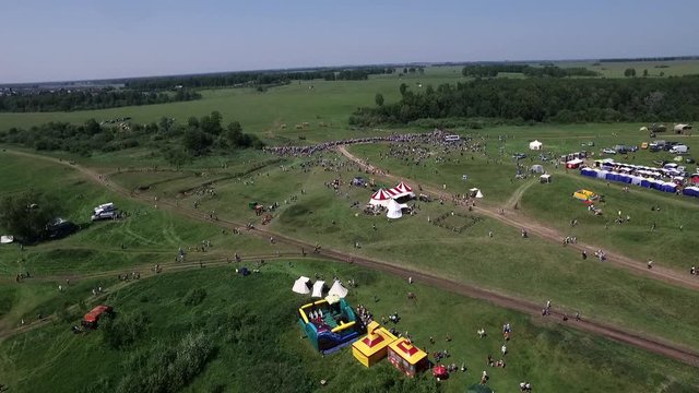 Dron top down many crowd man on open field relax in sunny day outdoor summer sky