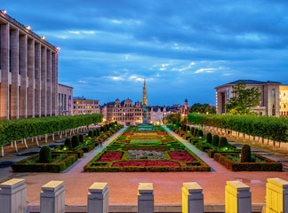 View over Mont des Arts Public Garden towards Town Hall Spire at dusk, Brussels, Belgium