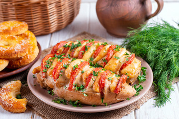 Chicken fillet baked with tomatoes and cheddar cheese