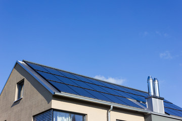 solar panel on a rooftop of a modern house