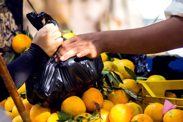  12.11.2019, Egypt, Hurghada. Sellers and buyers at fruits and vegetables bazaar