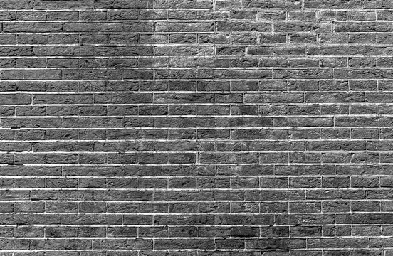 Fototapeta Brick wall. Grey brick wall as abstract background.
