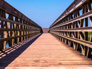 Bridge to Beach as a path with blue sky