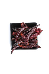 Handul of spicy dried red chili peppers chile de arbol