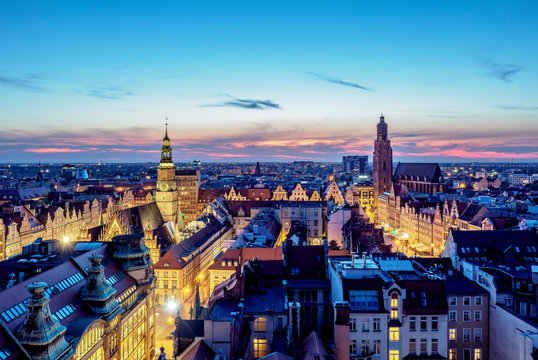 Skyline with Old Town Hall and St. Elizabeth Church at dusk, elevated view, Wroclaw, Lower Silesian Voivodeship, Poland