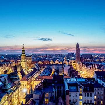 Skyline with Old Town Hall and St. Elizabeth Church at dusk, elevated view, Wroclaw, Lower Silesian Voivodeship, Poland