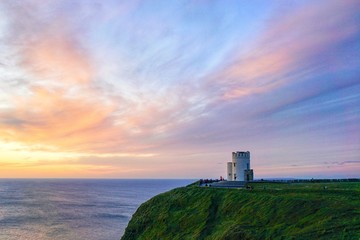 Sunset at O’Brien Tower, Cliffs of Moher, County Clare, Ireland - obrazy, fototapety, plakaty