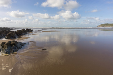 A reflective Croyde beach in North Devon
