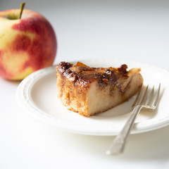 piece of cake on a plate apple fork