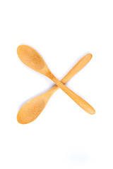 Two shallow bamboo spoons in a shape for display