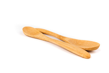 Two shallow bamboo spoons in a shape for display