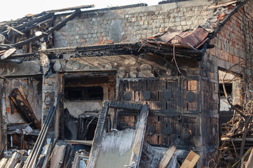 Burnt remains of a property after an house fire