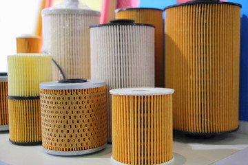 New car oil and air filters on stand, car parts technology, image for background