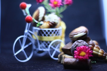 composition with chocolate and flowers