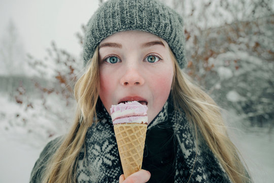 Beautiful girl eating ice cream