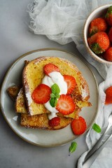 Breakfast French toast with berries, overhead view