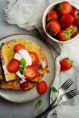 Breakfast French toast with berries, overhead view
