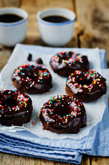 Baked chocolate doughnuts with chocolate glaze