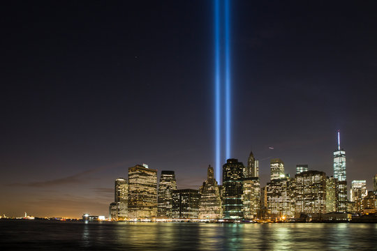 Manhattan skyline and Financial District at night.