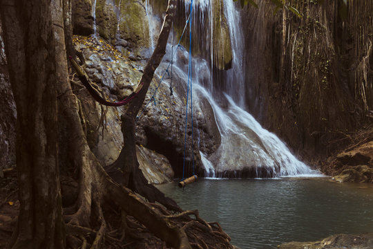 Swing near waterfall
