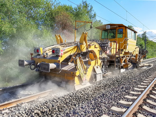 Heavy machinery repairs rail lines